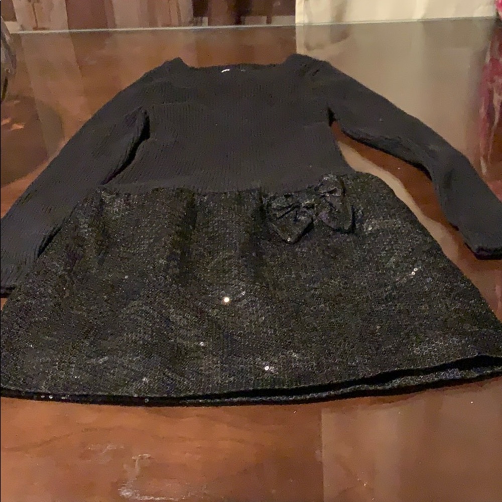 Black sequence with bow
